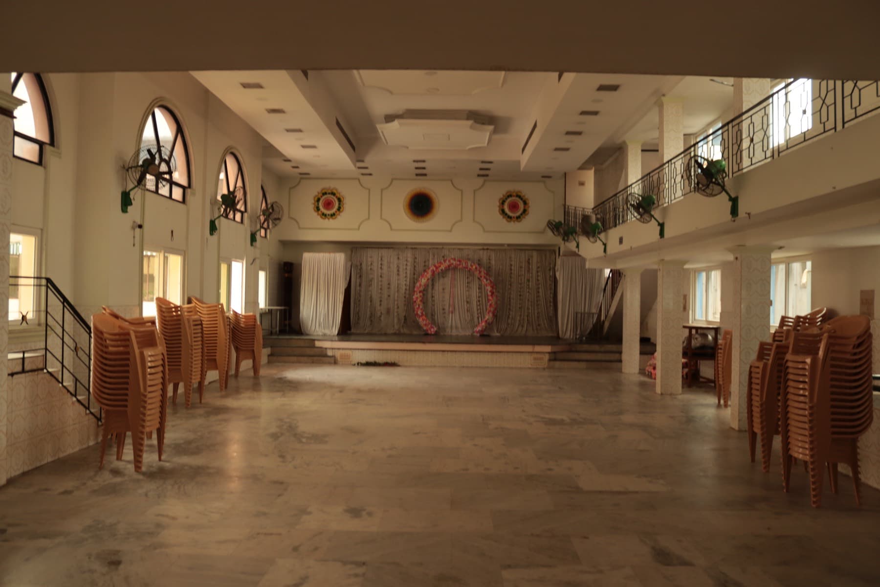 Main Hall interior with stage and stacked seating