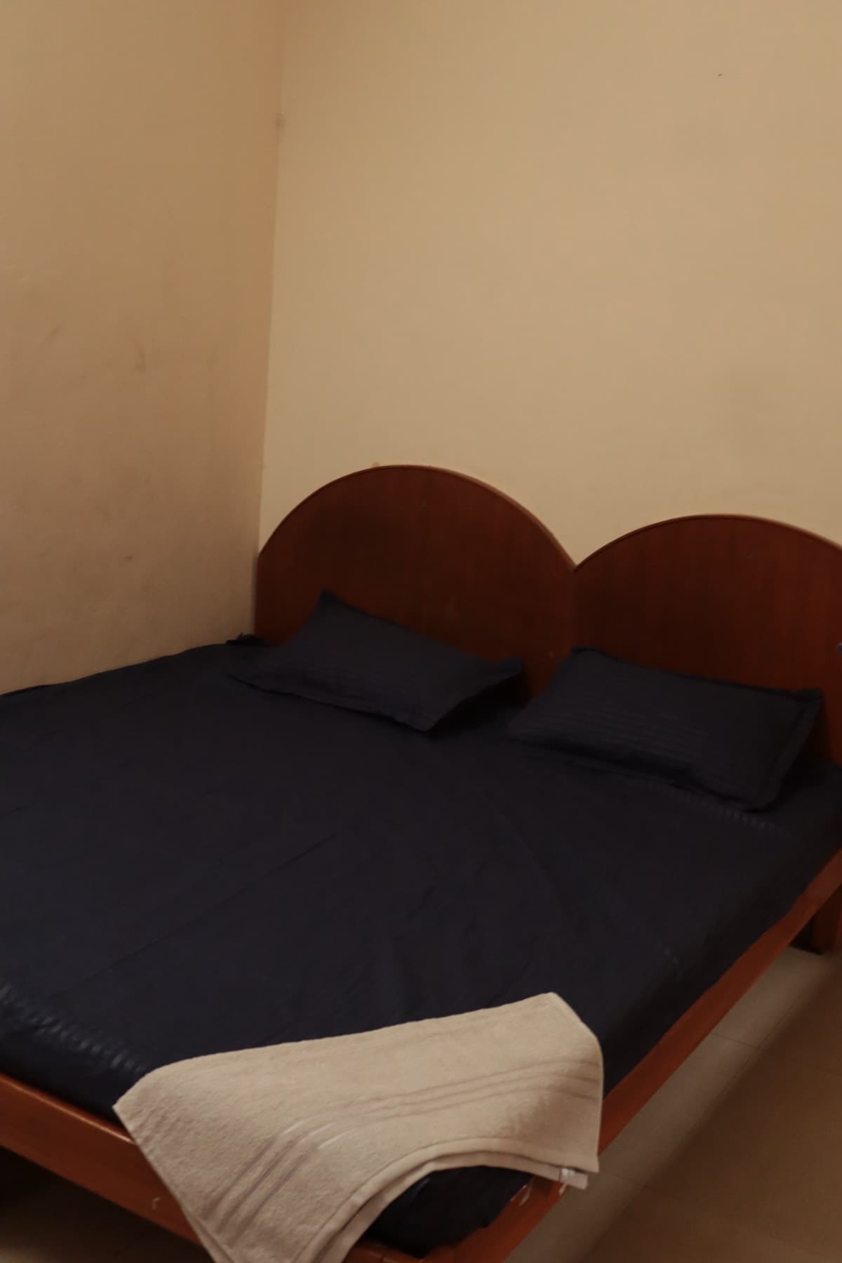 Deluxe AC Double Room bed and clear floor space